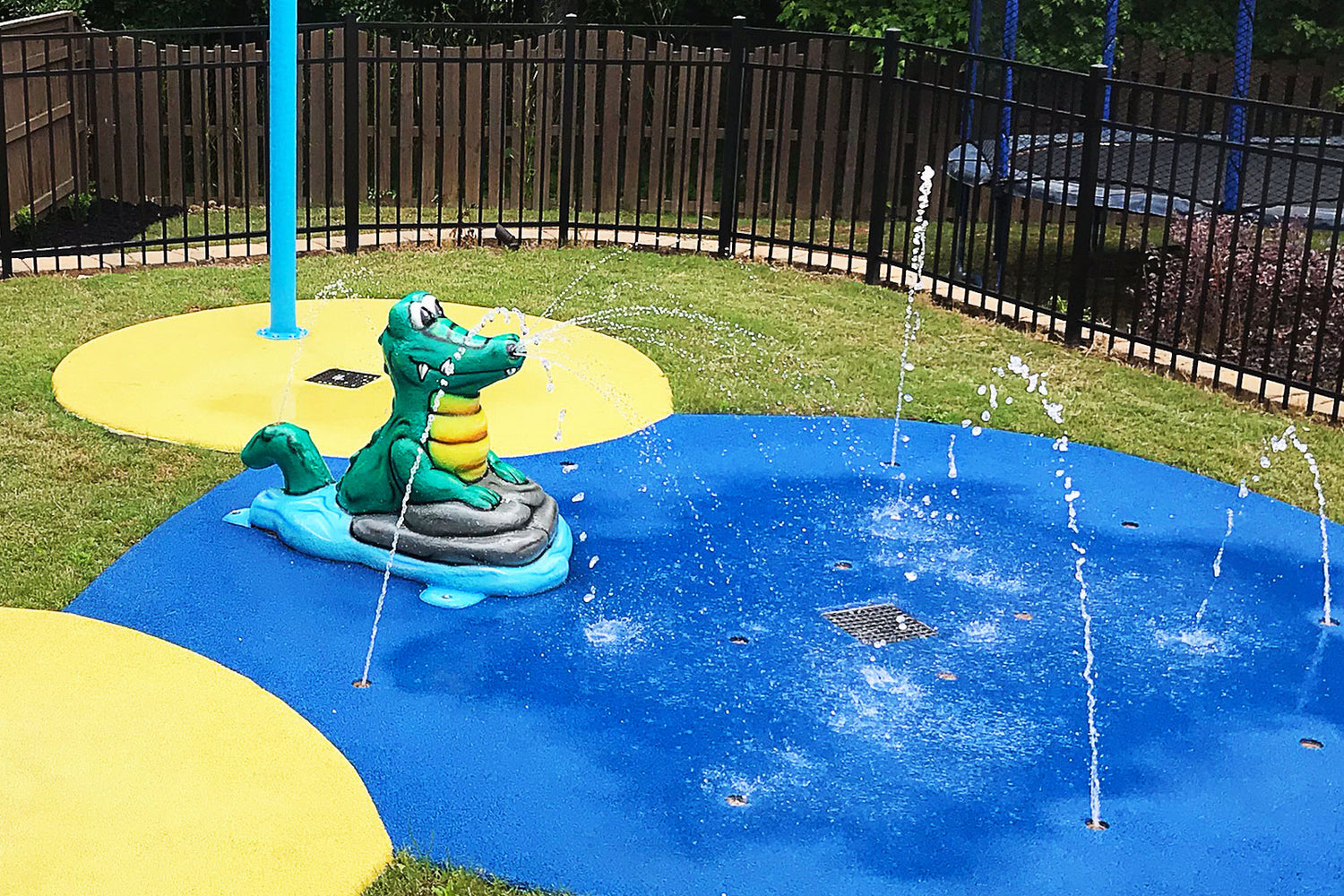gator water play feature installed on a my splask pad kit.